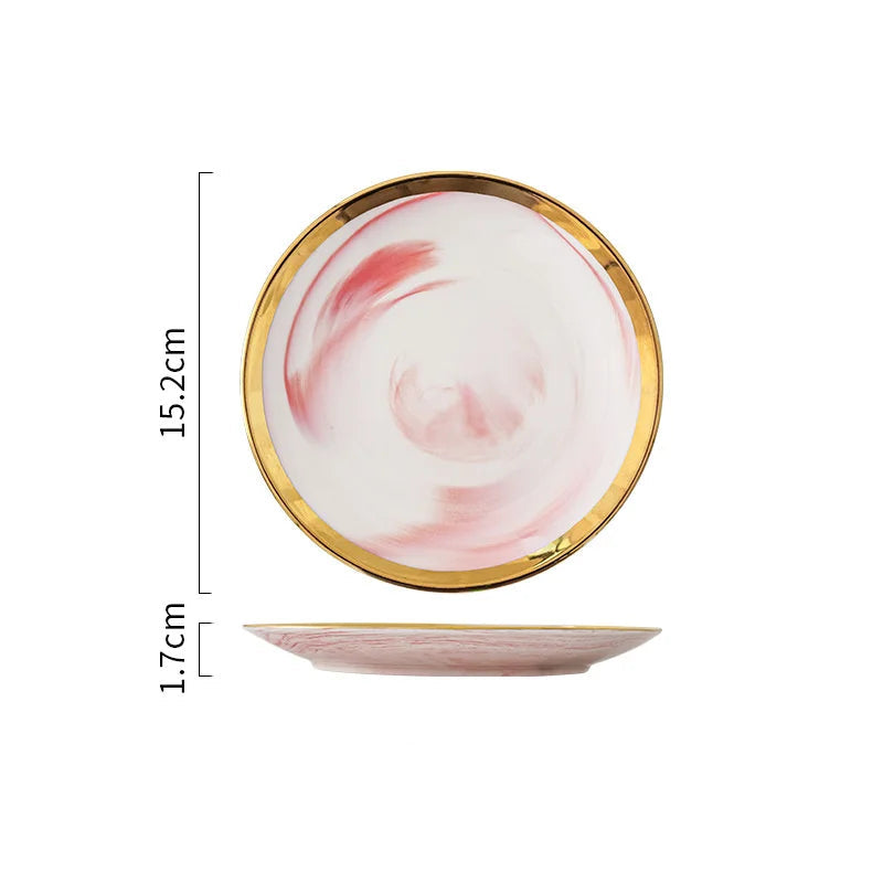 Assiette Rose Marbré à Bord Doré Elégante