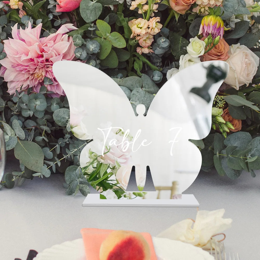 support papillon argenté numéro de table mariage épuré